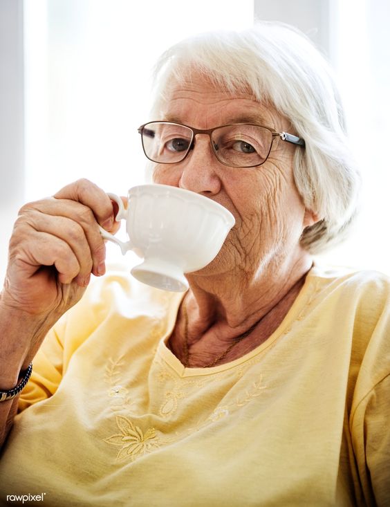Old Lady Drinking Tea